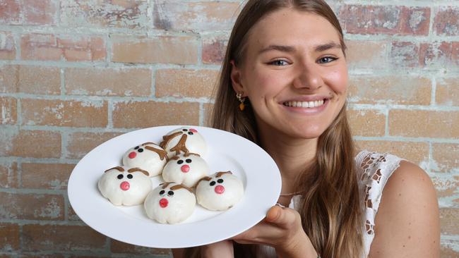 Food influencer Montana Hughes with the Coles Christmas Reindeer Bao Buns. Picture: Liam Kidston