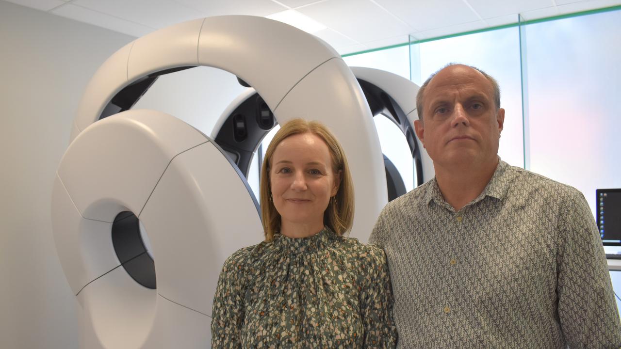 Leith Banney and John Evans of Dermatology Solutions in front of the new 3D imaging machine.