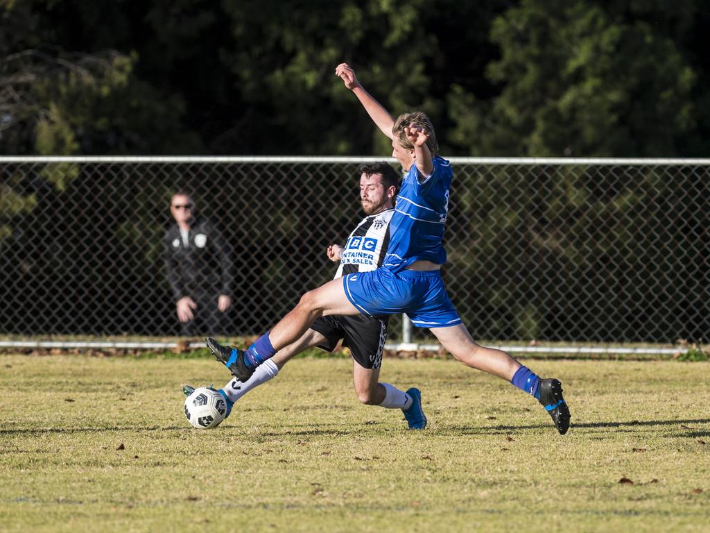 Ryan Crawford (left) of Willowburn and Jase Sampson of Rockville Rovers in Toowoomba Football League Premier Men round 13 at Captain Cook reserve, Sunday, June 20, 2021. Picture: Kevin Farmer