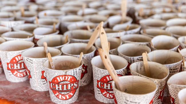 Resin prepared in old hot chips containers is used to repair and strengthen the whale bones. Picture: Helen Orr