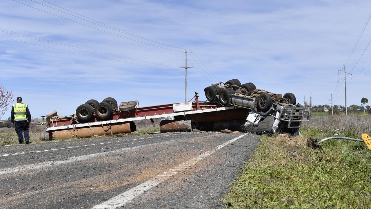 A man has died after high semi-trailer rolled on the New England Highway at East Greenmount.