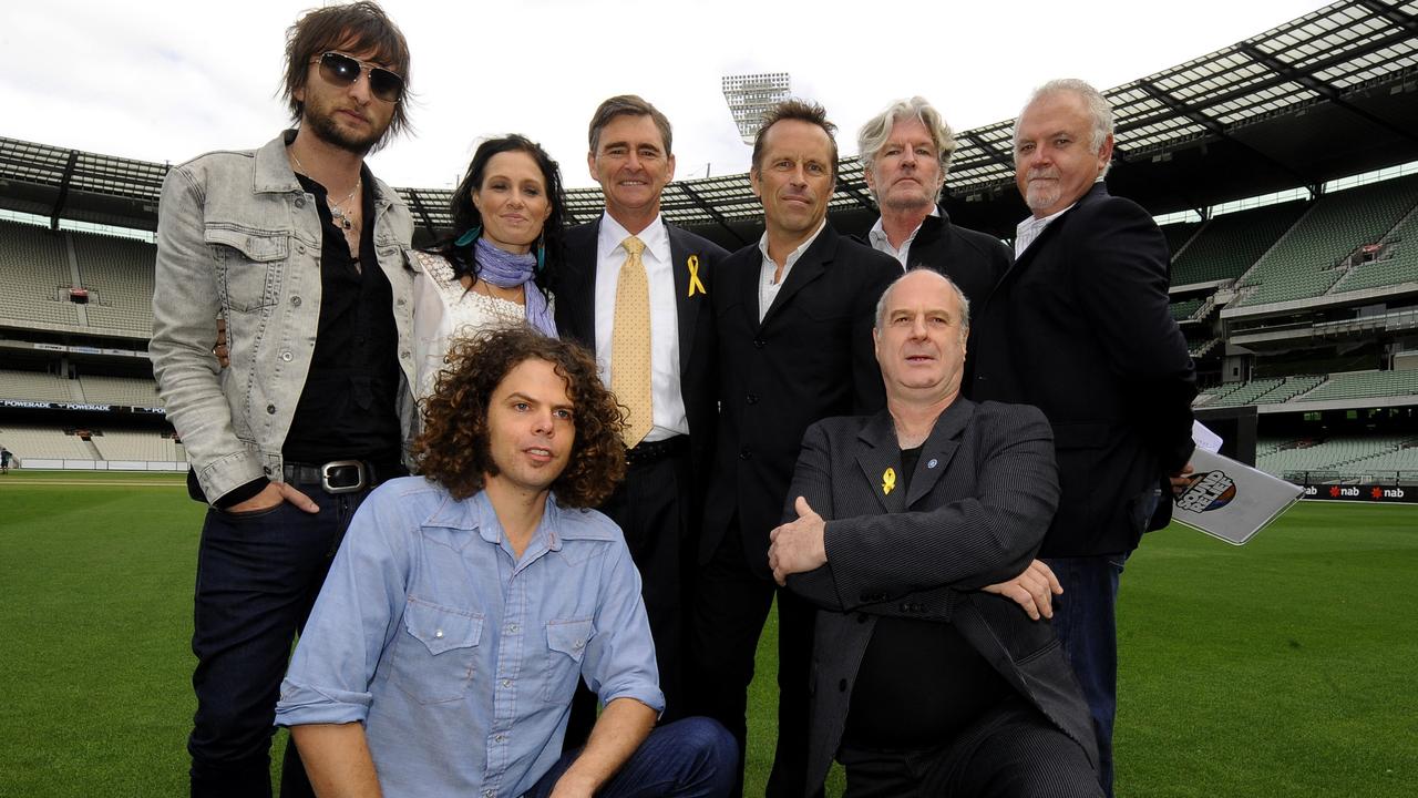 Gudinski made things happen from Sound Relief benefit concert to The Sound live music show during Covid. With Nic Cester (Jet), Andrew Stockdale (Wolfmother), Kasey Chambers, John Brumby (Victorian Premier), Mark Seymour (Hunters and Collectors, Tim Finn, Michael Gudinski (Frontier Touring) and Mark Pope (Mark Pope Music) at the MCG in 2009 for Sound Relief. Picture: AAP