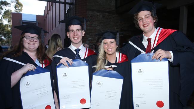 Bronte Cuffe, Andrew Dillon, Isabella Holland and Patrick Collins celebrate graduation. Picture: Alan Barber