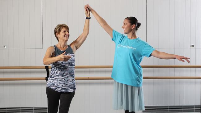 Dance instructor and Queensland Ballet Head of Community Engagement, Lily Spencer instructing Dance Moves participant Geraldine Keating, 67, in West End. Picture: Liam Kidston