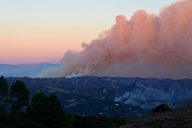 Smoke billows from the Palisades fire