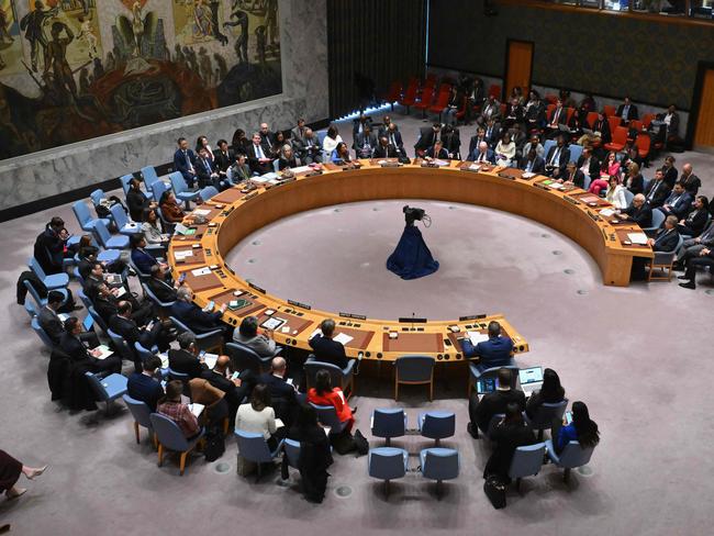 The United Nations Security Council meets on the situation in the Middle East, including the Palestinian question, at the UN headquarters in New York on March 25, 2024. After more than five months of war, the UN Security Council for the first time passed a resolution calling for an immediate ceasefire in Gaza. The United States, Israel's ally which vetoed previous drafts, abstained. (Photo by ANGELA WEISS / AFP)