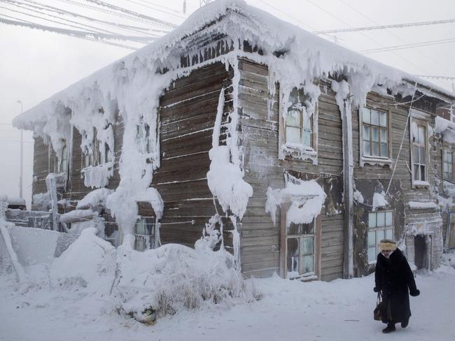 Frost-encrusted house in the city centre of Yakutsk. Picture: Amos Chapple/REX/Shutterstock/Australscope