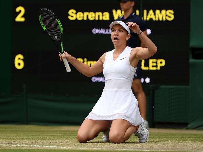 LONDON, ENGLAND - JULY 13: Simona Halep of Romania celebrates championship point in her Ladies' Singles final against Serena Williams of The United States during Day twelve of The Championships - Wimbledon 2019 at All England Lawn Tennis and Croquet Club on July 13, 2019 in London, England. (Photo by Shaun Botterill/Getty Images)