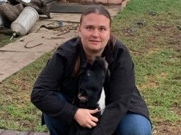 Eight-month-old staffie Vader with his owner Rebecca Neehs