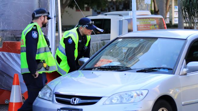 Police conducting checks at Griffith Street in Coolangatta. Picture: Scott Powick.