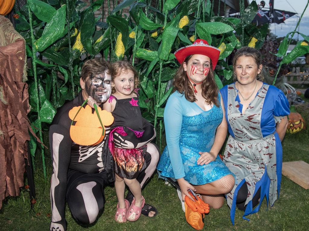 (from left) Dan and Billie Childe with Briella and Sandie Olive visit the Halloween display of Jo Philp. Monday, October 31, 2022. Picture: Nev Madsen.