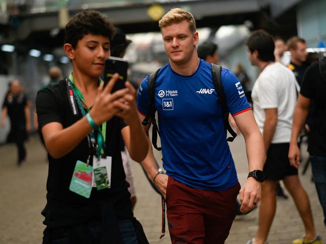 Mick Schumacher arrives in the paddock area at Interlagos. Picture: AFP