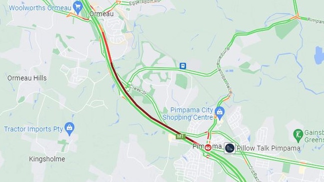 Traffic has backed up after a truck rolled on the M1 at Pimpama. Picture: Google