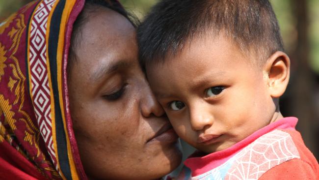 28-year-old Aziza shares a moment with her son after they receive medical care at a mobile health clinic being run by Bangladesh Red Crescent Society and ICRC in the Bangladesh camps. Picture: Bangladesh Red Crescent