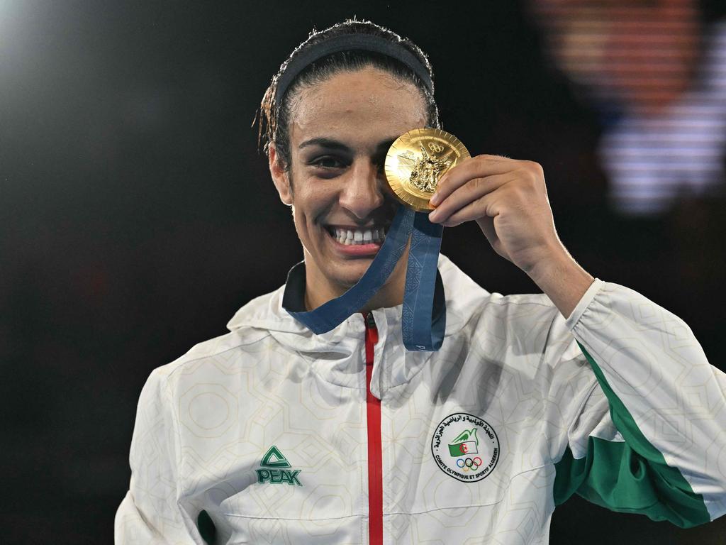 Algeria's Imane Khelif poses on the podium with the gold medal. Picture: AFP