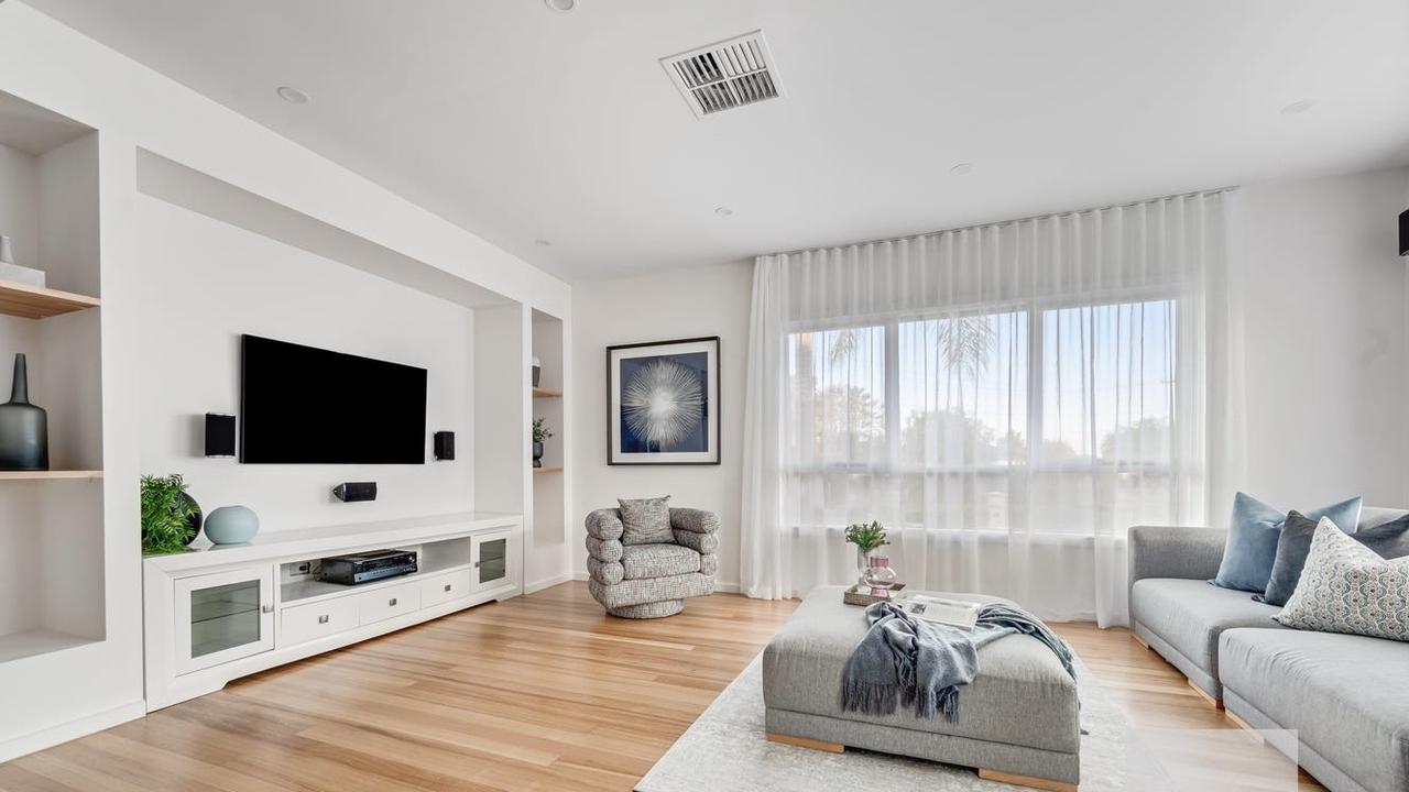 Inside the Gladstone Park home, high ceilings provide spacious living spaces for the lucky buyer.