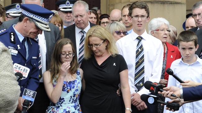 NSW Police Commissioner Andrew Scipione and the family of murdered policeman Bryson Anderson speak to the media outside the Supreme Court, Sydney. Picture: Craig Wilson