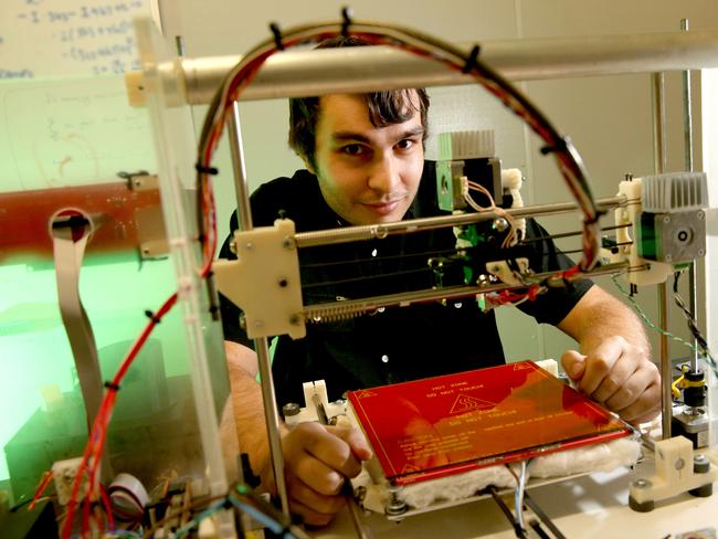 Print Manager Callum Cameron using 2D printer parts to make 3D printers at Substation 33, Kingston - Picture: Richard Walker