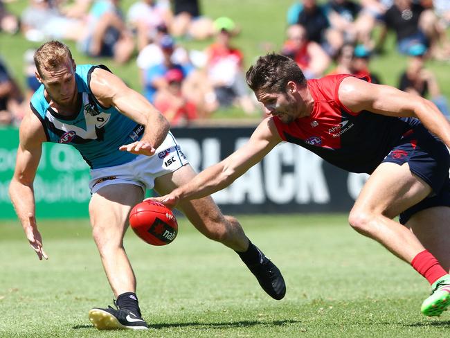 Jesse Hogan and Jack Hombsch had an intense battle inside Melbourne’s forward 50. Picture: Sarah Reed