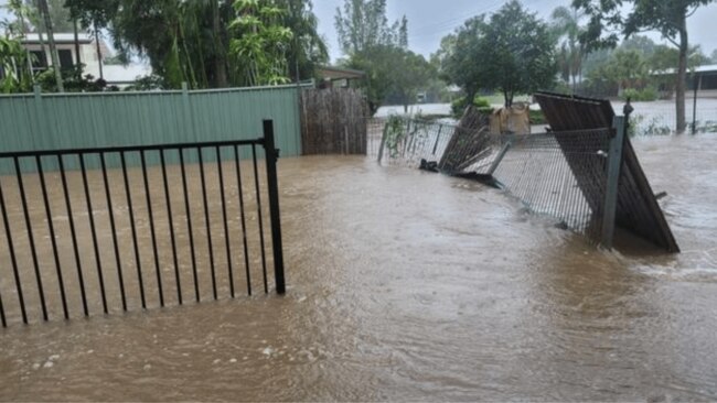 The family watched the flood waters rising. Source: 7News