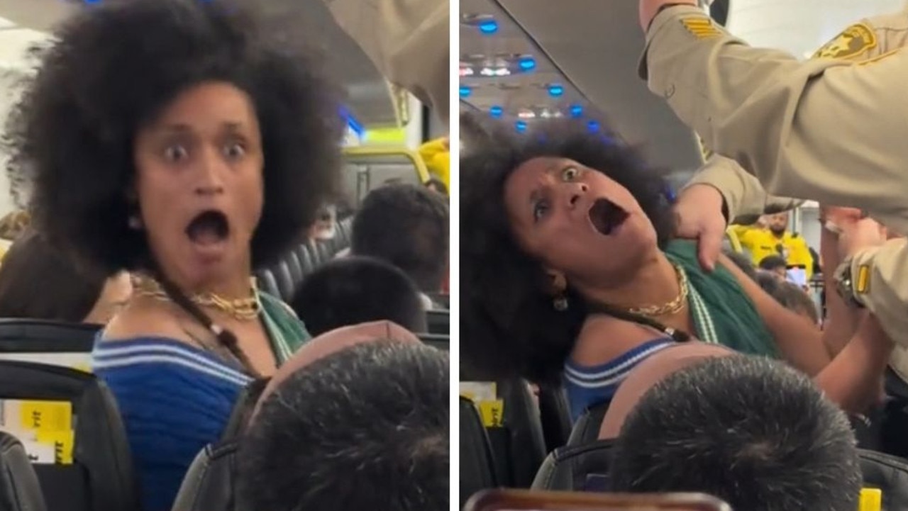 Woman loses it as she’s dragged off flight