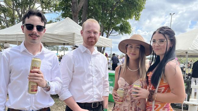 A group having fun at the Torbanlea Picnic Races.