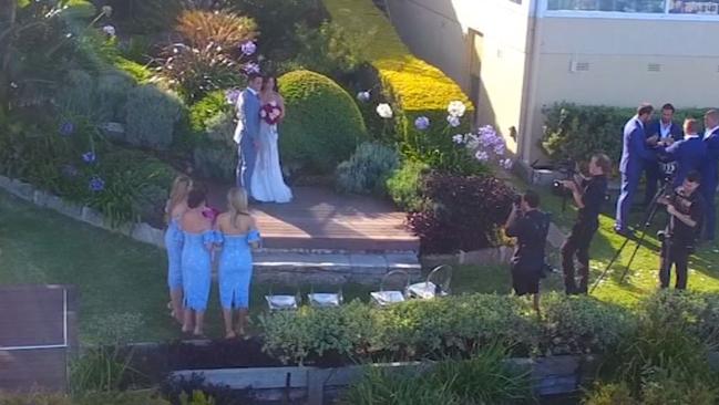 Cooper Cronk with his newlywed wife Tara Rushton pose for photographs at Whale Beach. Picture: Chris Erdos/ 7News