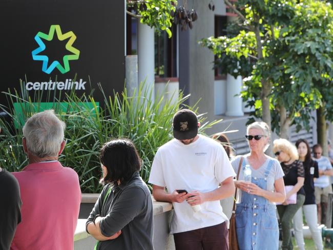 The queue outside Southport Centrelink at 8.40am this morning. Picture Glenn Hampson