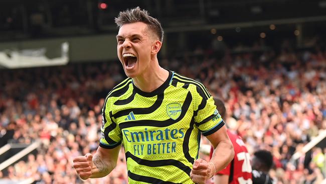 MANCHESTER, ENGLAND - MAY 12: Leandro Trossard of Arsenal celebrates scoring his team's first goal during the Premier League match between Manchester United and Arsenal FC at Old Trafford on May 12, 2024 in Manchester, England. (Photo by Stu Forster/Getty Images)