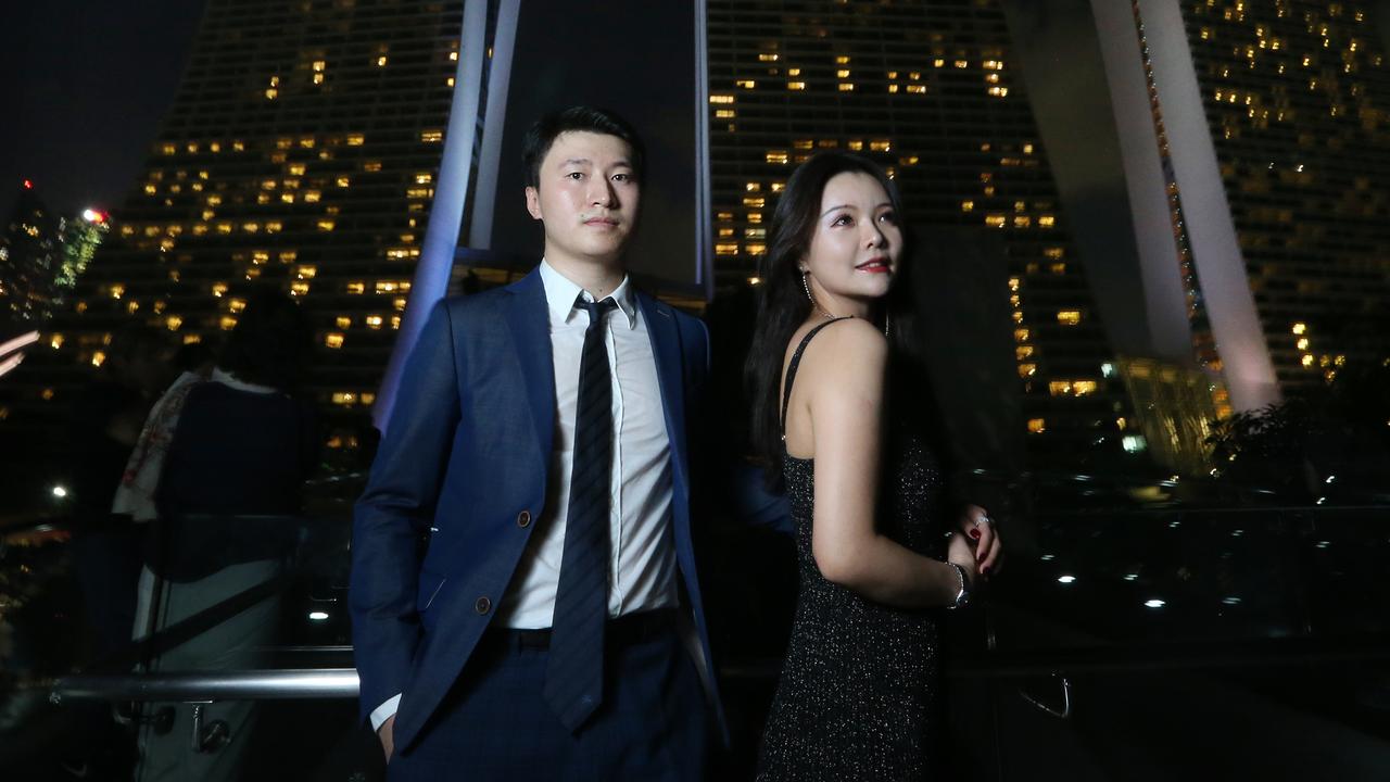 Tony Wang, with fiancee Abby Ding, represents the new generation of the Chinese diaspora in Singapore, patriotic and proud of the motherland. Picture: Vanessa Hunter