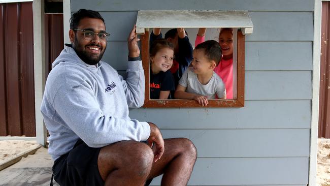 Early Childhood Educator at Awabakal Preschool in Glendale Ray Steadman is an pictured with kids Stella 4, Robert 5, Jarli 5 and Zarlia 5. Picture: Toby Zerna