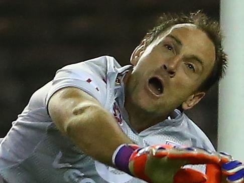 MELBOURNE, AUSTRALIA - NOVEMBER 28: Adelaide United goalkeeper Eugene Galekovic makes a save during the round eight A-League match between Melbourne City FC and Adelaide United at Etihad Stadium on November 28, 2015 in Melbourne, Australia. (Photo by Robert Cianflone/Getty Images)