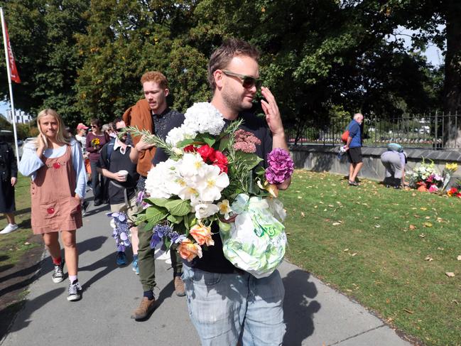 People began to place flowers at a local park. Picture Gary Ramage