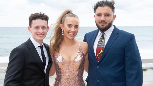 All the glitz and glamour: Newcastle High School students Brayden Knott, Ella Warrall, Dimitri Filactos. Credit: MSP Photography