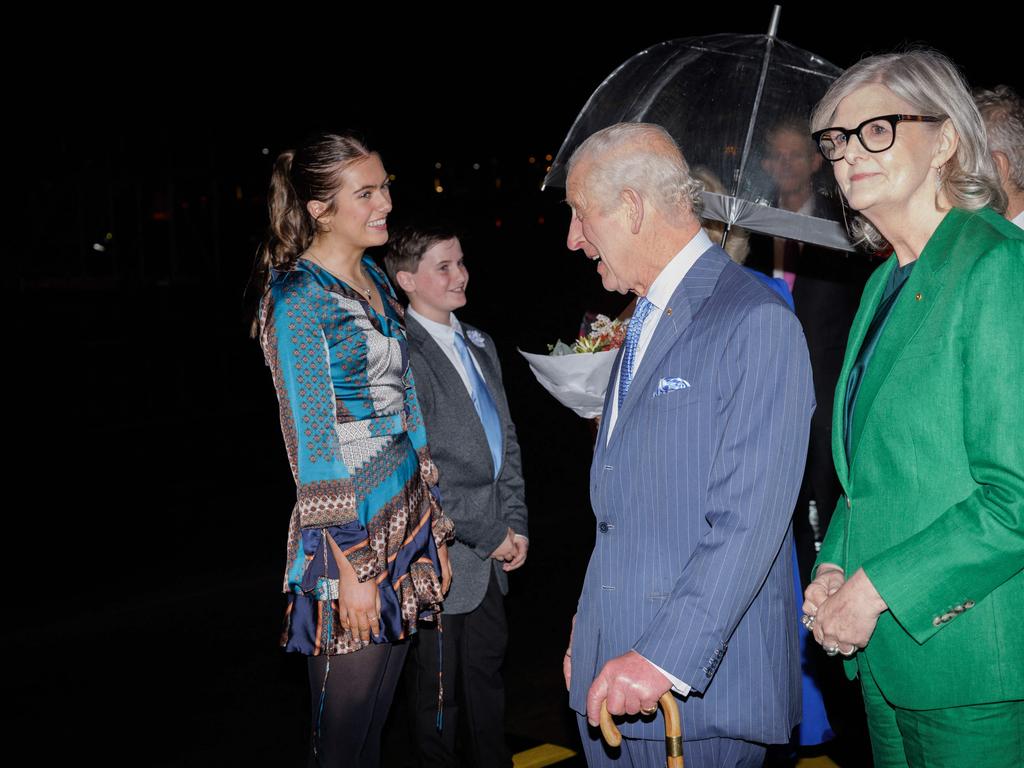 King Charles III speaks to 12-year-old Ky and his sister Charlotte after they presented a bouquet of flowers to Queen Camilla. The two young siblings were involved in a bone-marrow transplant and the meeting was organised by the Make-A-Wish Foundation. Picture: AFP