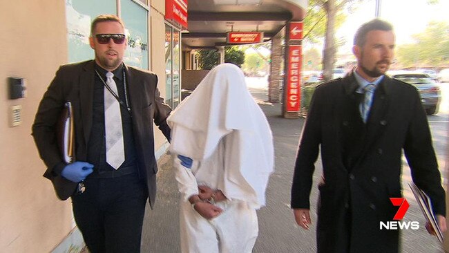 Colonades Murder suspect Jayden Tanee Lowah leaving Calvary Wakefield Hospital with detectives. Picture: 7 News Adelaide