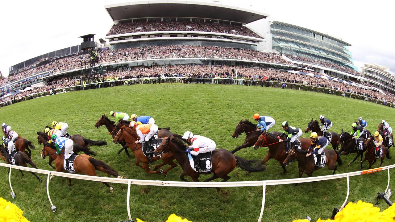 The field pass the post during race seven the Lexus Melbourne Cup during 2022 Lexus Melbourne Cup Day at Flemington Racecourse on November 01, 2022 in Melbourne, Australia. (Photo by Robert Cianflone/Getty Images)