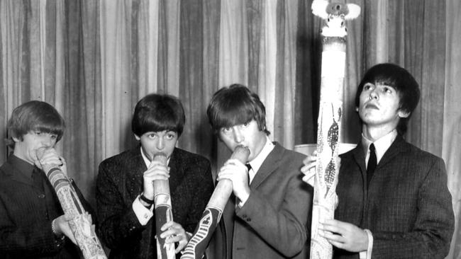 File Pix Beatles Australian tour 1964 (This pic may be Sydney) - (l-R) ringo Starr, Paul McCartney, John Lennon and George Harrison playing didgeridoos - music bands groups didgeridoo Picture: File Photo