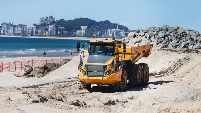 Work on the Currumbin Seawall continues next to the Currumbin Vikings SLSC. Picture Glenn Hampson