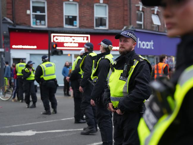 Police officers attend the anti-racism protest in Walthamstow. The group Stand Up To Racism organised counterprotests ahead of the planned far-right protests. Picture: Getty Images