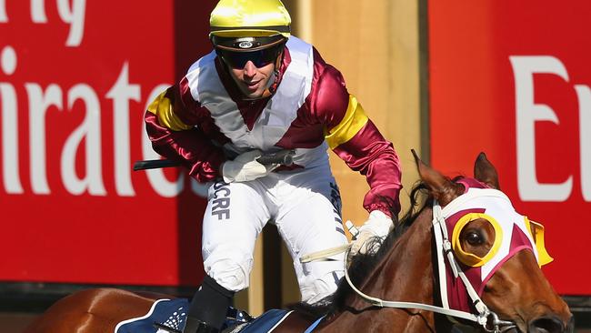 Take a bow: Brenton Avdulla and Lasqueti Spirit cross the finish line to win the Crown Oaks. Picture: Getty Images