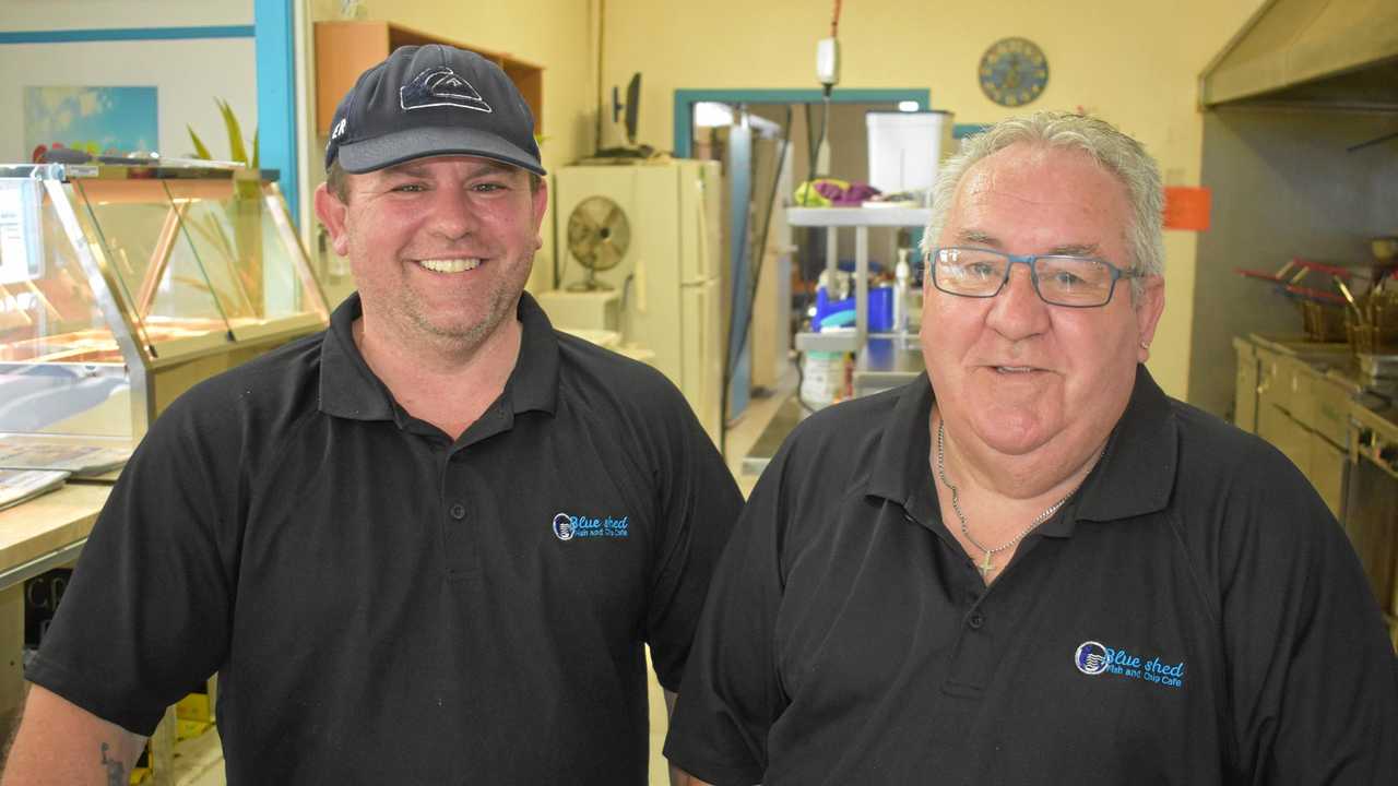 ORDER UP: Paul Cole and father John  are back in business at the Blue Shed Fish and Chips store 10 years after John established the shop. Picture: Ellen Ransley