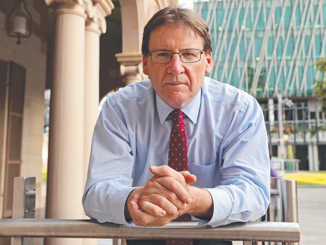 Peter Coaldrake, VC of QUT, is announcing fees following proposed deregulation , with the new Science and Engineering Centre behind, at the Gardens Point Campus in the CBD , Brisbane