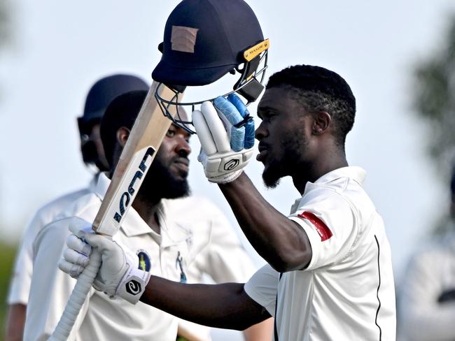 Carlos Maynard celebrates his hundred for PEGS. Picture: Andy Brownbill