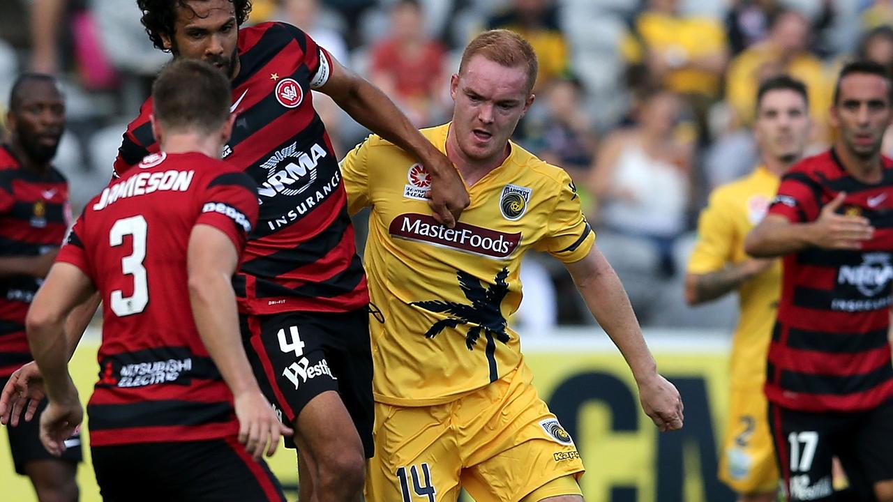 GOSFORD, AUSTRALIA - NOVEMBER 29: Nikolai Topor-Stanley of the Wanderers is contested by Daniel Heffernan of the Mariners during the round eight A-League match between the Central Coast Mariners and the Western Sydney Wanderers at Central Coast Stadium on November 29, 2015 in Gosford, Australia. (Photo by Ashley Feder/Getty Images)