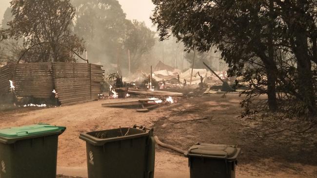 Houses have been razed along Terra Nova Drive, Mallacoota, in East Gippsland. Pictures: Luke McCrone.