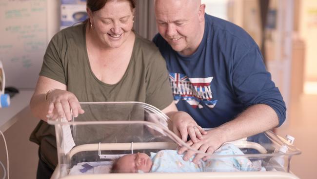 Stacey and Paul Och with baby Hendrix.