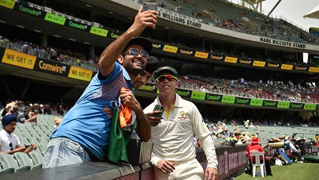 A fan takes a selfie with Marcus Harris in Adelaide. Picture: AFP