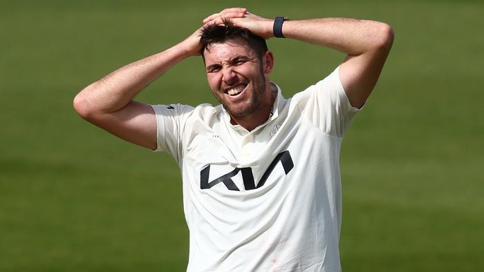 LONDON, ENGLAND - APRIL 12: Jamie Overton of Surrey reacts during the Vitality County Championship match between Surrey and Somerset at the Kia Oval on April 12, 2024 in London, England. (Photo by Ben Hoskins/Getty Images for Surrey CCC)