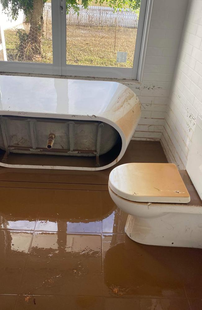 Mrs Smith and Mr Nicholl’s brand new bathroom has lost its shine, replaced by mud. Photo: Sophie Smith.